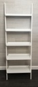 wall leaning free standing white bookcase